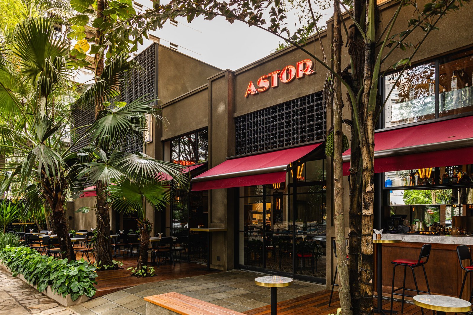 Astor: the corner bar opens a wider room
