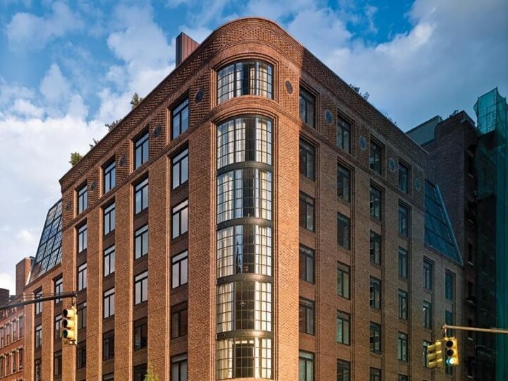 The brick exterior of The Greenwich Hotel in Tribeca, New York.