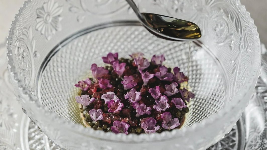 A plated dish with shiso flowers