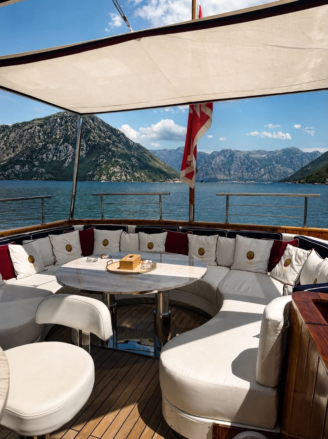 The aft deck of the Kalizma with mountains behind