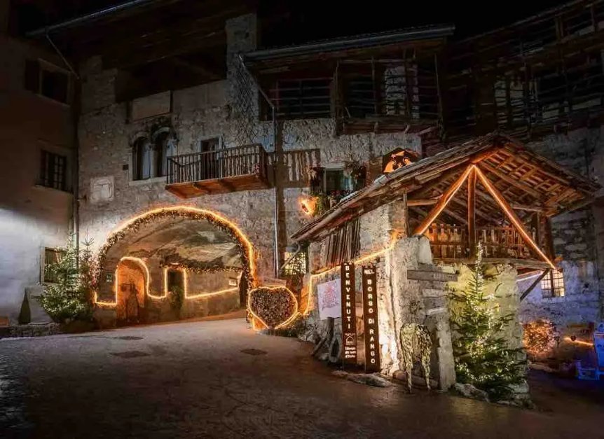 Advent lights in a historic Alpine village street