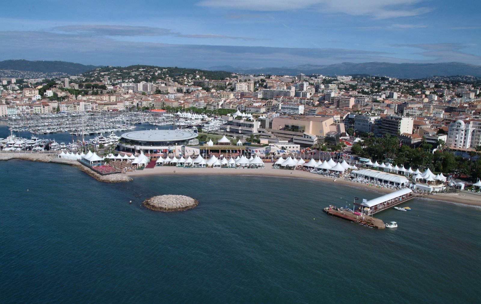 Aerial view of Cannes with the Palais des Festivals, the harbour and the Croisette