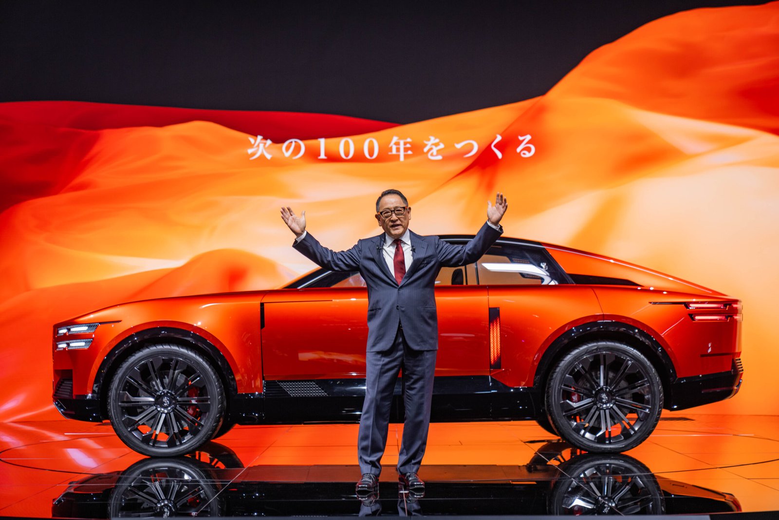 Akio Toyoda presenting the Century Concept Model