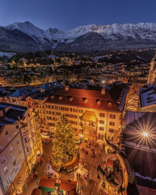 Christmas chalets lining a historic square