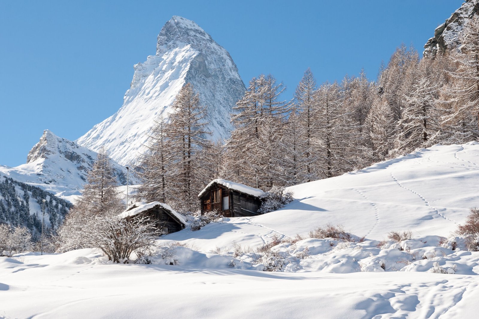 Zermatt chalets in the snow with the Matterhorn behind