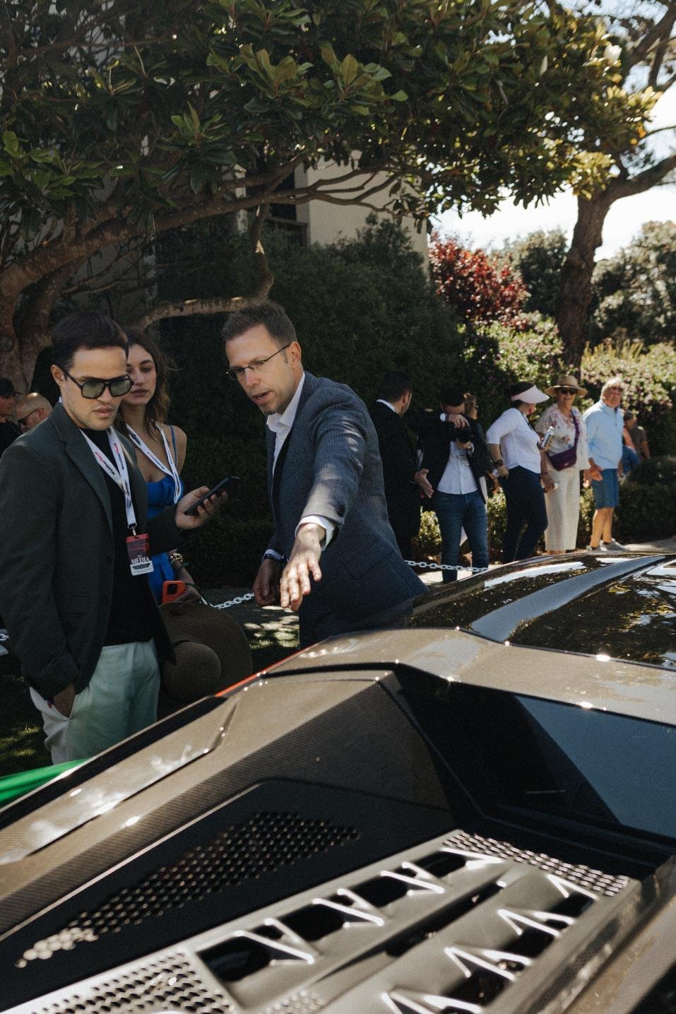 Gabriel Silveirado with Rouven Mohr, Lamborghini's chief technical officer, at The Quail