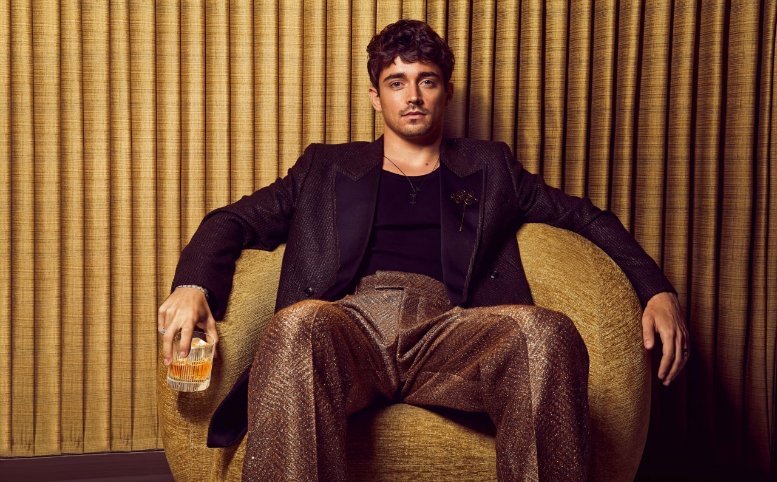 Charles Leclerc in a Ferrari team portrait