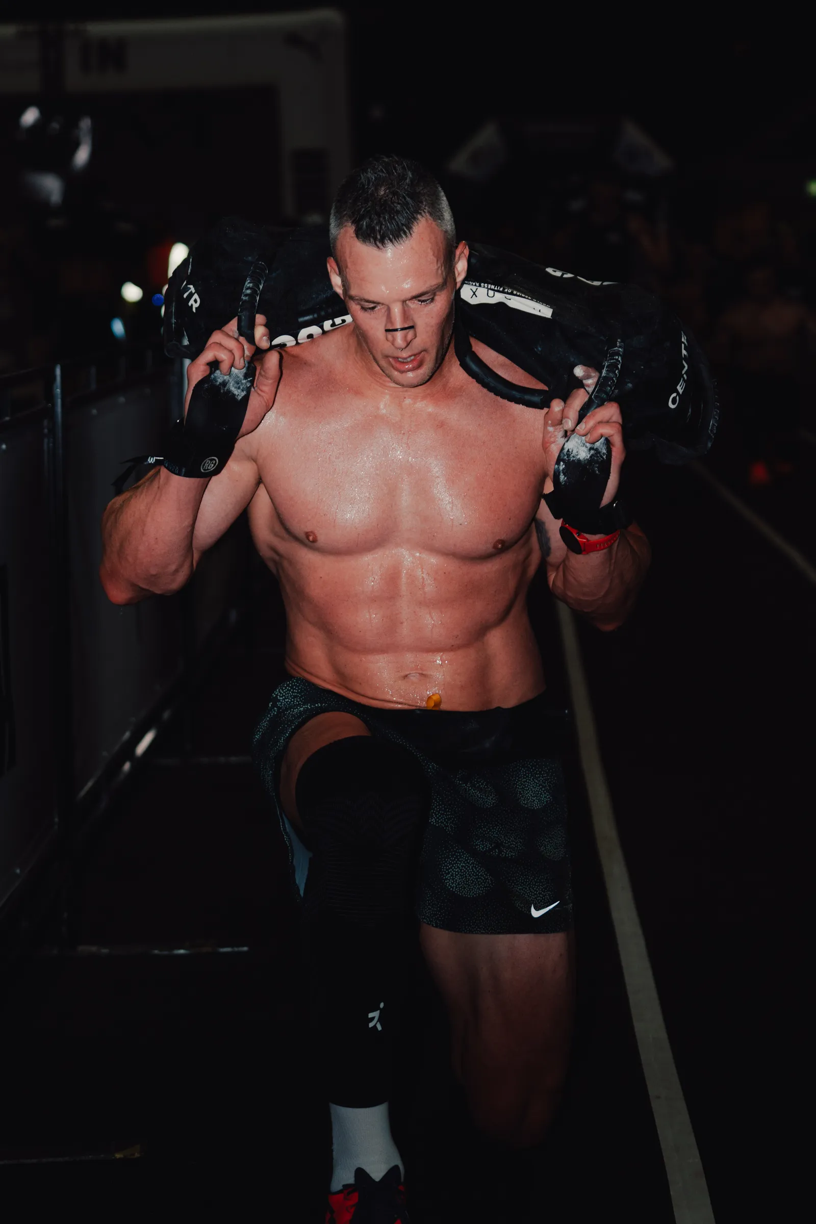 Augie Lengling during the sandbag lunges station at the HYROX World Championships