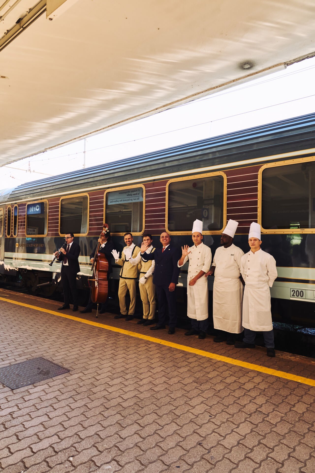 The La Dolce Vita Orient Express at the station, with the brigade and musicians