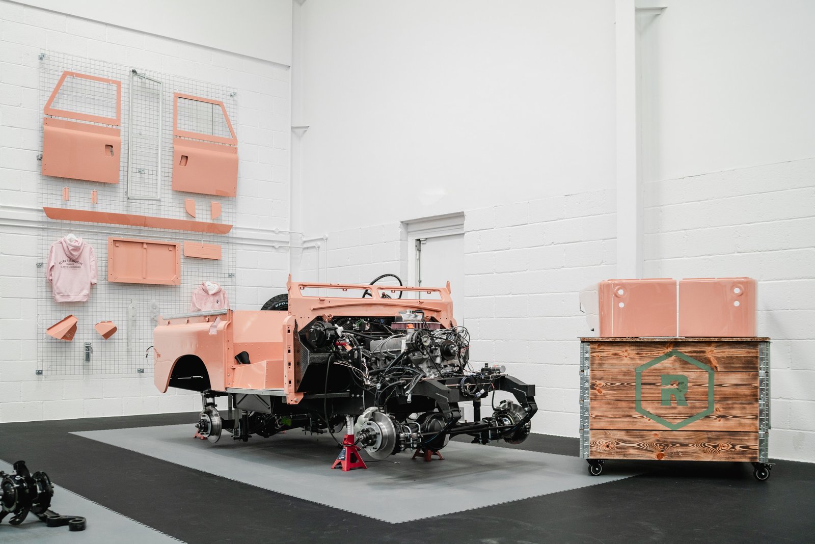 A Land Rover Defender being rebuilt in a specialist workshop