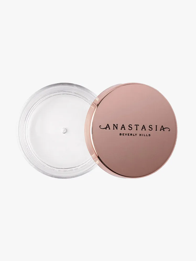 Strong-hold brow gel brushed upwards with a spoolie
