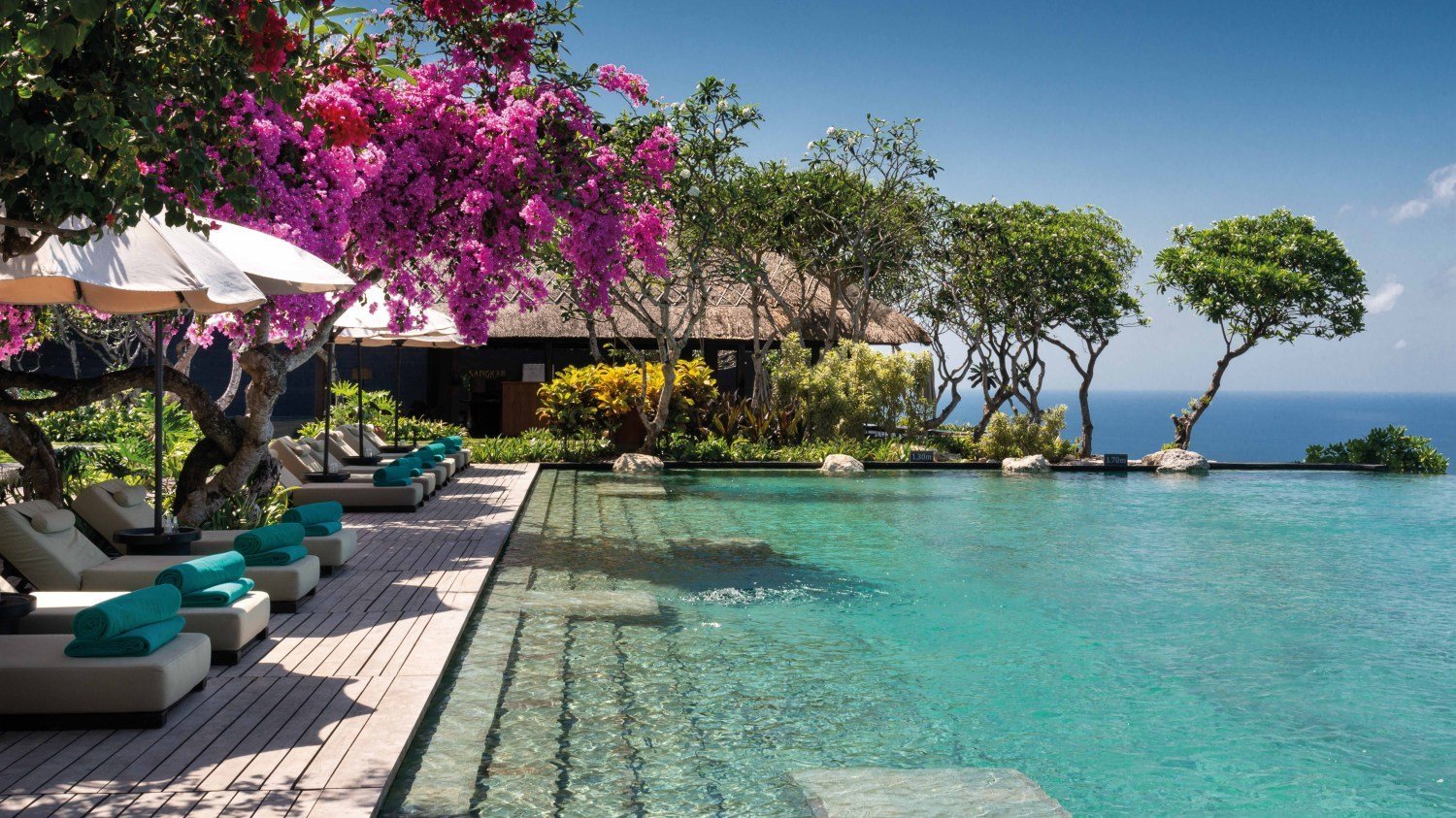 Bulgari Resort Bali: a cliffside interior in timber and ikat