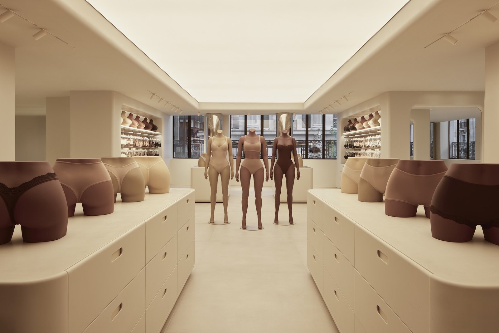 Interior of the Skims London store with curved walls in neutral tones