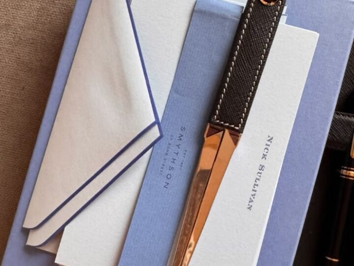A letter, with the hand still visible